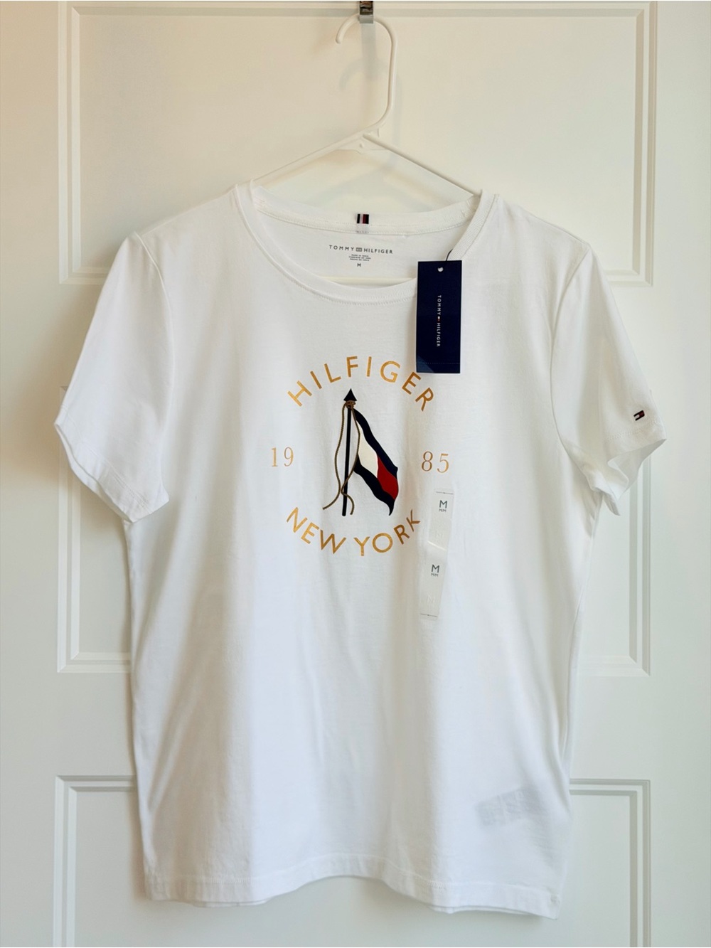Tommy Hilfiger White Short Sleeve Tee with Gold Print and Tricolor Flag